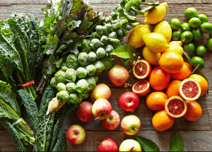 a group of fruits and vegetables on a wood surface Healthy Weight Loss Diets yorkshire